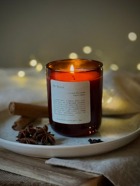 Fir Trees candle by Aroma Quartz — smoke rising from extinguished wick
