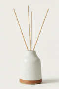 Aroma Quartz Frosted Oat refillable ceramic diffuser — lifestyle shot