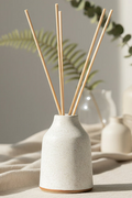 'Frosted Oat' Refillable Ceramic Diffuser by Aroma Quartz — refillable ceramic diffuser on neutral background