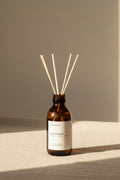 Lemon Ginger reed diffuser by Aroma Quartz — brown glass bottle with wooden reeds