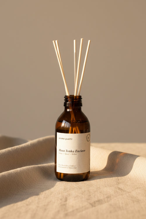 Moss Tonka Enclave reed diffuser by Aroma Quartz — brown glass bottle with wooden reeds