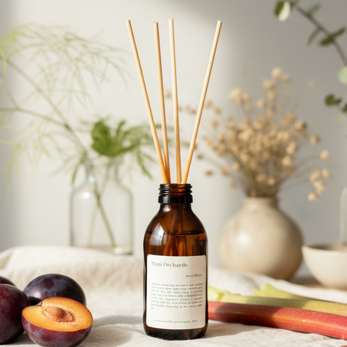 Plum Orchards reed diffuser by Aroma Quartz — brown glass bottle with wooden reeds