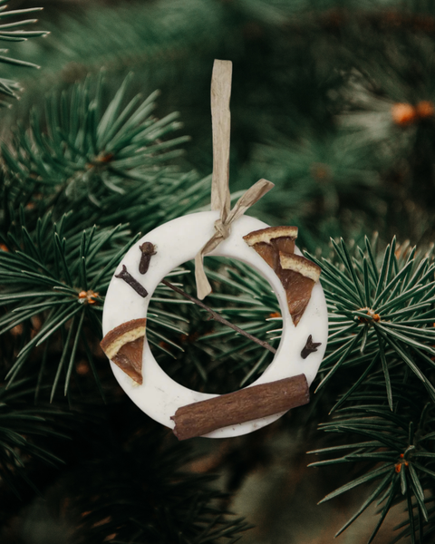 Aroma Quartz  tree decoration — wax ornament on neutral background